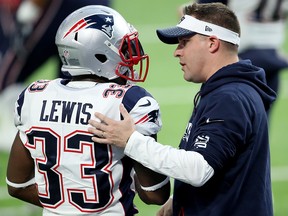 Josh McDaniels talks with Dion Lewis prior to Super Bowl LII against the Philadelphia Eagles at U.S. Bank Stadium on February 4, 2018 in Minneapolis, Minnesota. (Andy Lyons/Getty Images)