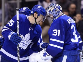 Toronto Maple Leafs left winger James van Riemsdyk congratulates goaltender Frederik Andersen (31) after beating the Nashville Predators in Toronto on Wednesday, February 7, 2018. (THE CANADIAN PRESS/Frank Gunn)