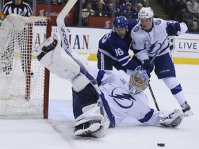 Toronto Maple Leafs centre Mitch Marner (16) is blocked off the puck by Tampa Bay Lightning goaltender Andrei Vasilevskiy in Toronto on Monday February 12, 2018. (Veronica Henri/Toronto Sun)