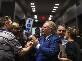 Doug Ford shakes hands with a supporter as he leaves after speaking at his - Rally for a Stronger Ontario - regarding his bid for the Ontario PC leadership at the Toronto Congress Centre in Toronto, Ont. on Saturday February 3, 2018. Ernest Doroszuk/Toronto Sun/Postmedia Network