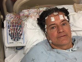 Toronto Sun columnist Lorrie Goldstein undergoes an electroencephalogram (EEG), which is a brain scan to measure electrical activity in the brain, at Sunnybrook hospital after suffering a stroke.