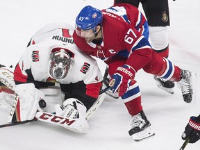 Montreal Canadiens left wing Max Pacioretty (67) moves in on Ottawa Senators goaltender Mike Condon (1) in Montreal, Sunday, February 4, 2018. (THE CANADIAN PRESS/Graham Hughes)