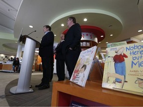 Toronto Mayor John Tory and and Budget Chief Gary Crawford (R) were at Cedarbrae library in Scarborough - near Lawrence Ave. E. and Markham Rd. - announcing the City Budget has earmarked and will be investing $182 million in the Toronto Public Library, including opening nine additional library branches on Sunday February 11, 2018. Jack Boland/Toronto Sun/Postmedia Network