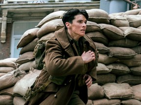 This image released by Warner Bros. Pictures shows Fionn Whitehead in a scene from "Dunkirk." (Melissa Sue Gordon/Warner Bros. Pictures)