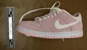 Mujey Dumbuyas pink Nike runner found at the scene of her death. KALAMAZOO POLICE