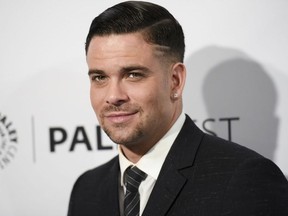 In this March 13, 2015 file photo, Mark Salling arrives at the 32nd annual Paleyfest "Glee" in Los Angeles.