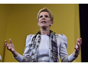 Ontario Premier Kathleen Wynne speaks to media at the Legislative Assembly of Ontario in Toronto on Thursday Jan. 25, 2018. Ontario is about to introduce a bill allowing it to retaliate against any state that adopts Buy American provisions, then plans to start a national conversation with other provinces about measures to punish new cases of procurement protectionism.THE CANADIAN PRESS/Frank Gunn ORG XMIT: CPT133