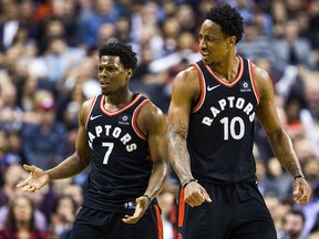 Toronto Raptors Kyle Lowry (left) and DeMar DeRozan react to a call against the Milwaukee Bucks at the Air Canada Centre in Toronto Friday, February 23, 2018. (Ernest Doroszuk/Toronto Sun)