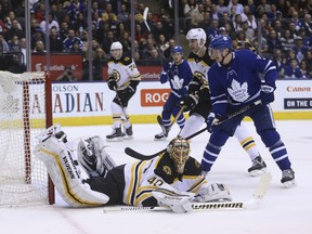 Boston Bruins goalie Tuukka Rask is beaten by  Maple Leafs forward Mitch Marner (not pictured) during the first period at the Air Canada Centre on Saturday night. )Jack Boland/Toronto Sun)