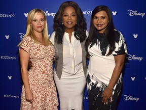 Reese Witherspoon, Oprah Winfrey and Mindy Kaling of A Wrinkle in Time are seen here at Disney's D23 EXPO 2017 in Anaheim, Calif. A Wrinkle in Time will be released in theatres on March 9, 2018. (Alberto E. Rodriguez/Getty Images for Disney)