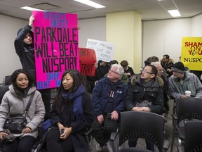 Rent strikers from a rental building at 1251 King Street West and fellow protesters gather in a Social Justices Tribunal Ontario hearing room, in Toronto on Friday, February 2, 2018.
