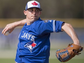 Toronto Blue Jays pitcher Aaron Sanchez throws live batting practice during spring training in Dunedin, Fla. on Tuesday, February 20, 2018. (THE CANADIAN PRESS/Frank Gunn)