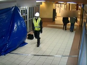 This man in a construction uniform is wanted in a jewelry heist.