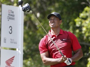 Tiger Woods tees off during the final round of the Honda Classic Sunday, Feb. 25, 2018, in Palm Beach Gardens, Fla. (AP Photo/Wilfredo Lee)