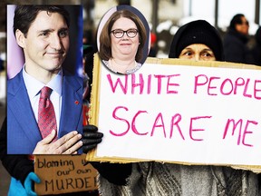 A women holds a sign during a rally in response to Gerald Stanley's acquittal in the shooting death of Colten Boushie in Edmonton, Alta., on Saturday, February 10, 2018. (Inset are Trudeau and Philpott)  THE CANADIAN PRESS/Jason Franson