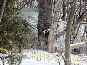 Police continue to investigate on Mallory Crescent on Tuesday February 6, 2018.   A  large tent is placed in the backyard,while a team digs for human remains of victims associated with alleged serial killer Bruce McArthur. Veronica Henri/Toronto Sun/Postmedia Network