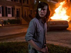 Chandler Riggs as Carl Grimes on The Walking Dead. Photo Credit: Gene Page/AMC