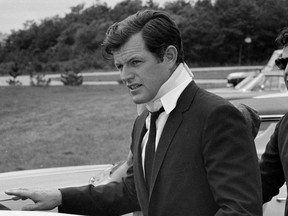This July 22, 1969, file photo shows U.S. Sen Edward Kennedy arriving back at his home in Hyannis Port, Mass., after attending the funeral of Mary Jo Kopechne in Pennsylvania.