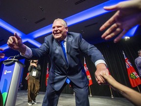 Doug Ford on stage at the Toronto Congress Centre in Etobicoke on Monday night. (ERNEST DOROSZUK, Toronto Sun)