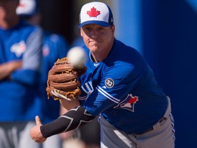 Toronto Blue Jays pitcher Aaron Loup pitches during spring training in Dunedin on Feb. 18, 2018