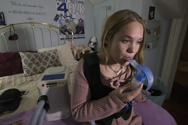 Madi Vanstone , 16 years old, is living a perfectly normal life , living with Cystic Fibrosis, as long as she continues her daily life -saving medication. Some of her friends in the Cystic Fibrosis community are not as lucky. The drug necessary for their form of decease is not covered under OHIP.  Tuesday March 27, 2018. Stan Behal/Toronto Sun/Postmedia Network