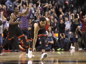 Raptors guard Fred VanVleet celebrates after hitting a three-pointer
against the Dallas Mavericks on Friday. (THE CANADIAN PRESS)