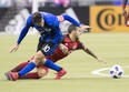 Montreal Impact midfielder Ignacio Piatti  battles for the ball with Toronto FC's Sebastian Giovinco during their game earlier this month.
(THE CANADIAN PRESS)