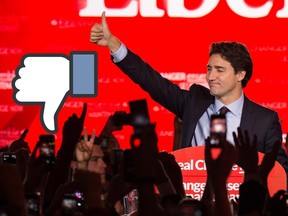 Justin Trudeau waves on stage in Montreal on October 20, 2015 after the Liberals won the the general election.