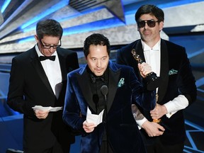 Production designers Jeff Melvin, Paul Denham Austerberry and Shane Vieau accept Best Production Design for 'The Shape of Water' onstage during the 90th Annual Academy Awards at the Dolby Theatre at Hollywood & Highland Center on March 4, 2018 in Hollywood, California.