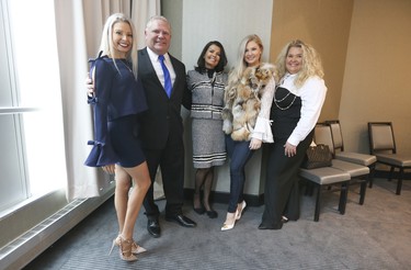 PC candidate Doug Ford with his wife Karla (R) and daughters Kyla (L), Kayla and Kara (far right) and daughters at the  Ontario PC leadership convention on Saturday March 10, 2018. Jack Boland/Toronto Sun/Postmedia Network