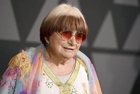 In this Nov. 11, 2017 file photo, filmmaker Agnes Varda arrives at the 9th annual Governors Awards in Los Angeles. (Jordan Strauss/Invision/AP, File)