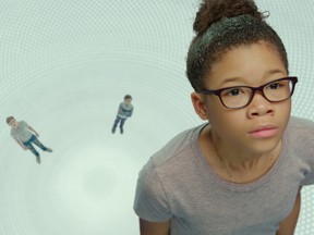 This image released by Disney shows Storm Reid in a scene from "A Wrinkle In Time." (Atsushi Nishijima/Disney)