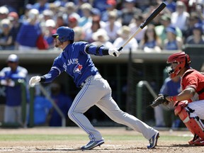 Blue Jays' Josh Donaldson singles off Philadelphia Phillies starting pitcher Vince Velasquez during the first inning of a spring training baseball game in Clearwater, Fla. (AP Photo/Chris O'Meara)