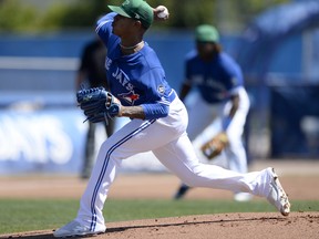 Blue Jays starting pitcher Marcus Stroman throws a pitch during the first inning of yesterdays spring  game against the Orioles at Dunedin.  (AP Photo/Jason Behnken)