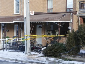 A row house on Mansfield Ave., in Toronto's Little Italy, was badly damaged when an SUV crashed through its front window early on Tuesday, March 13, 2018.