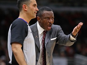 Raptors coach Dwane Casey argues with referee Zach Zarba during a game against the Bulls at the United Center on Feb. 14, 2018