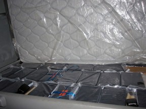 Bricks of cocaine that were found among the nearly 100 kgs of cocaine seized on December 2, 2017. Agents at Coutts  border crossing found 84 bricks containing nearly 100 kgs of cocaine in the cab of a commercial vehicle. The commercial vehicle was hauling produce from California to an Alberta business. SUPPLIED PHOTO