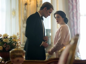 In this image released by Netflix, Claire Foy, right, and Matt Smith in a scene from "The Crown." (Robert Viglasky/Netflix via AP)