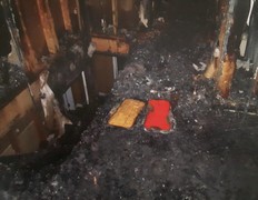 A court exhibit photo shows the melted beer cooler