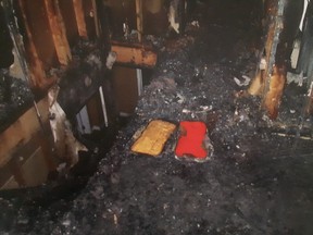 A court exhibit photo shows the melted beer cooler