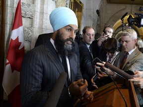 NDP Leader Jagmeet Singh speaks to reporters following the tabling of the budget in the House of Commons on Parliament Hill in Ottawa on Tuesday, Feb. 27, 2018.