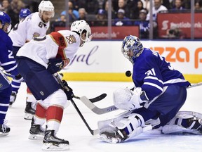 Toronto Maple Leafs goaltender Frederik Andersen (31) makes a save on Florida Panthers centre Jared McCann (90) during third period NHL hockey action in Toronto on Wednesday, March 28, 2018. THE CANADIAN PRESS/Frank Gunn