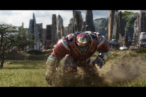 Robert Downey Jr.’s Iron Man wearing his Hulkbuster armour in a scene from Marvel’s Avengers: Infinity War.