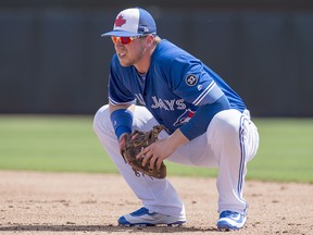 Toronto Blue Jays first baseman Justin Smoak keeps an eye on the action during exhibition action against the Detroit Tigers in Dunedin, Fla. on Sunday, February 25, 2018. (THE CANADIAN PRESS/Frank Gunn)
