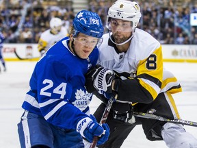 Toronto Maple Leafs Kasperi Kapanen during third period action against the Pittsburgh Penguins Brian Dumoulin at the Air Canada Centre in Toronto on Saturday March 10, 2018. (Ernest Doroszuk/Toronto Sun/Postmedia Network)