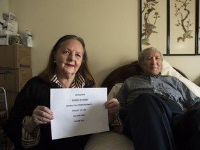Marcel Rozen, right, and his wife Julia Rozen pose for a photograph at their home in Toronto on Wednesday, March 28, 2018. Julia Rozen has been placing signs on message boards throughout the city pleading with the public for a kidney donation after learning her husband would have to wait six to eight years to receive a kidney.