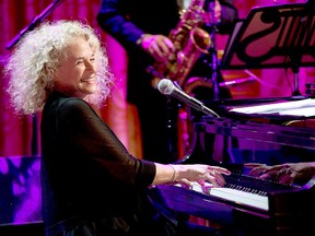 In this May 22, 2013, file photo, Carole King performs after U.S. President Barack Obama presented her with the Library of Congress Gershwin Prize for Popular Song in the East Room of the White House in Washington. (AP Photo/Jacquelyn Martin, File)