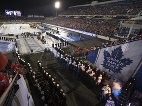 The Maple Leafs walk on to the ice during an outdoor game against the Washington Capitals on Saturday night. (Mitchell Leff/Getty Images)