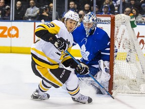 Maple Leafs goalie Frederik Andersen guards the crease in front of the Penguins’ Carl Hagelin at the ACC last night. 
Ernest Doroszuk/Toronto Sun/Postmedia Network
