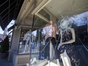 Broken glass at Pippe and Prue after act of vandalism in which many store fronts were targeted along Locke Street in Hamilton, Ont. on Sunday March 4, 2018. Ernest Doroszuk/Toronto Sun